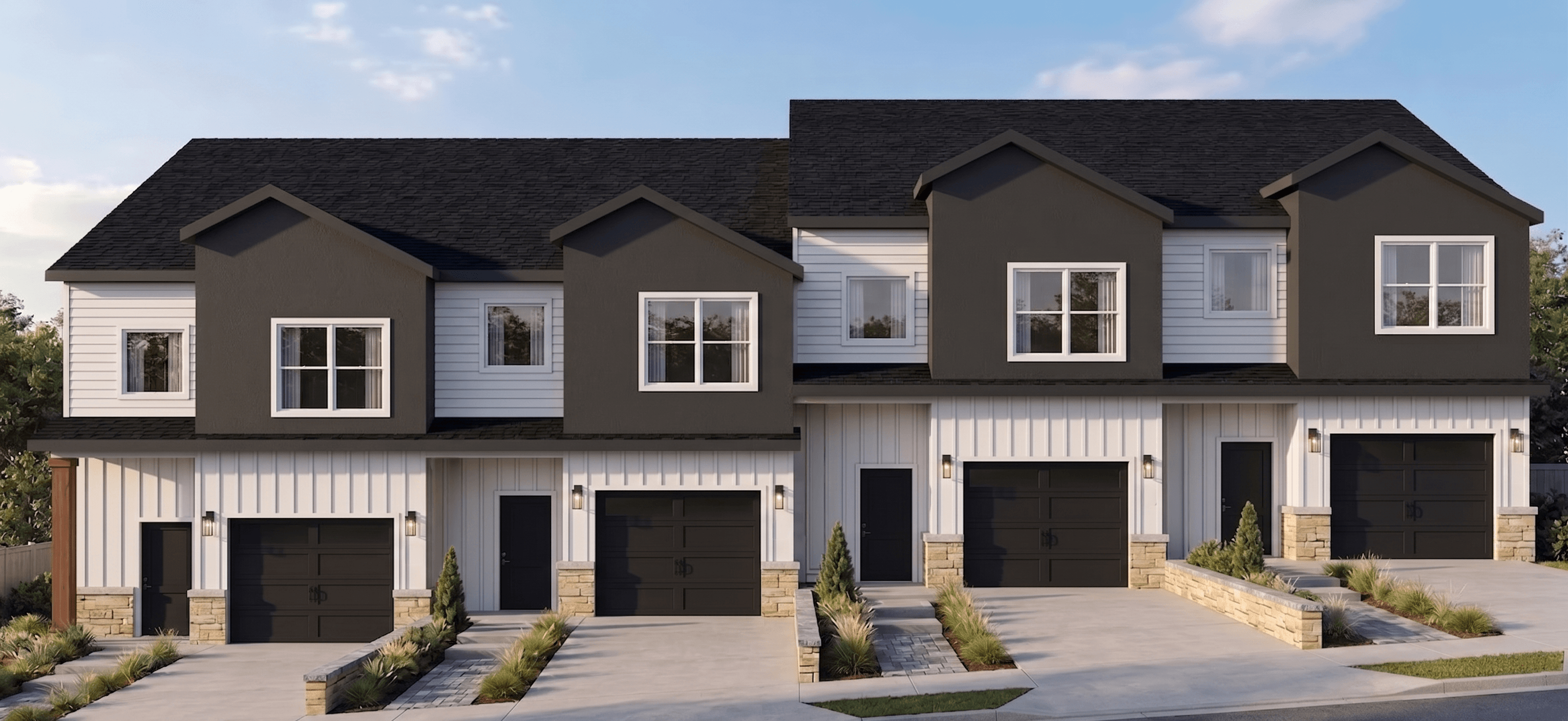 A modern two-story house with a white garage door.